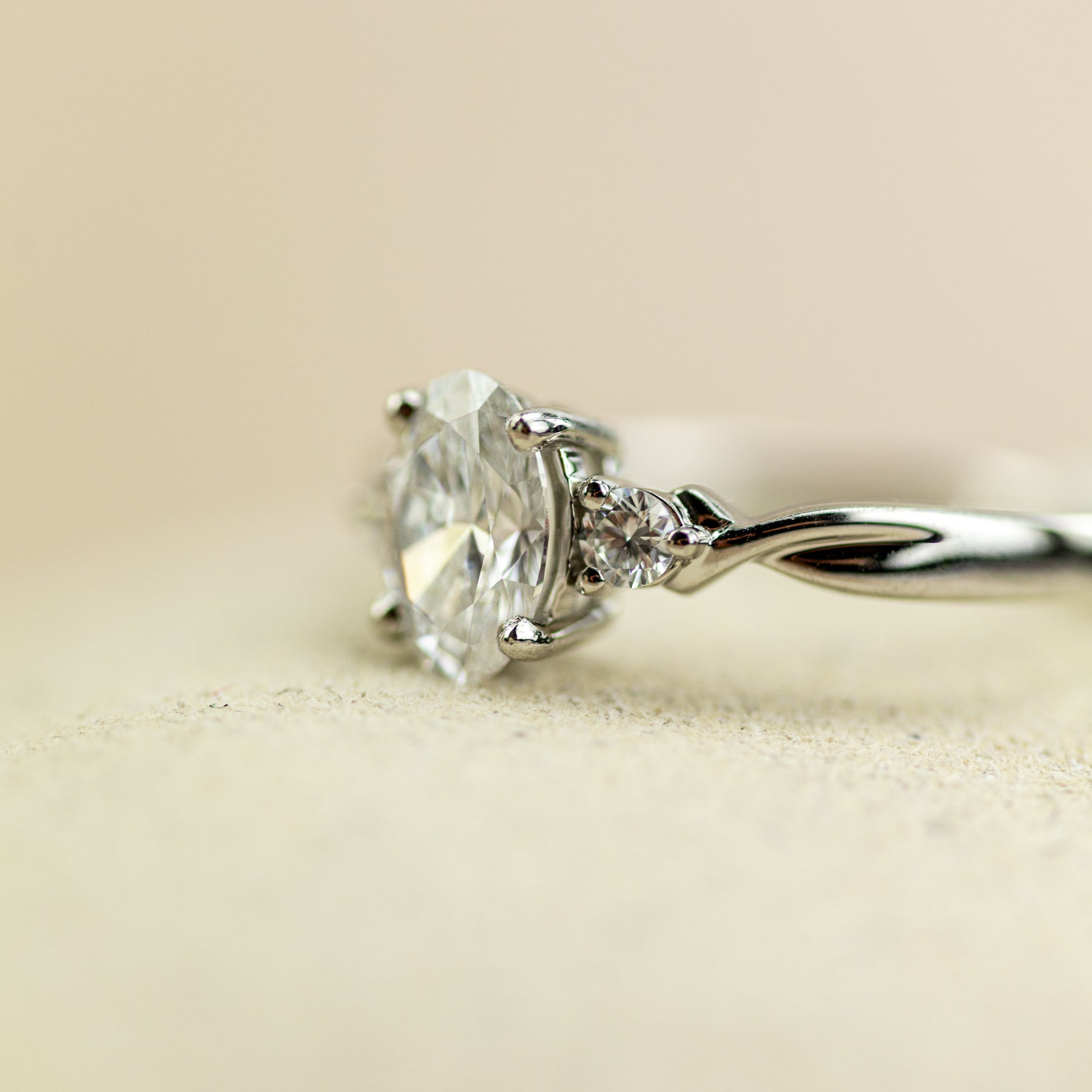 Platinum 0.70ct Oval Cut Solitaire Ring With Round Shoulders at RR Jewellers Yarm