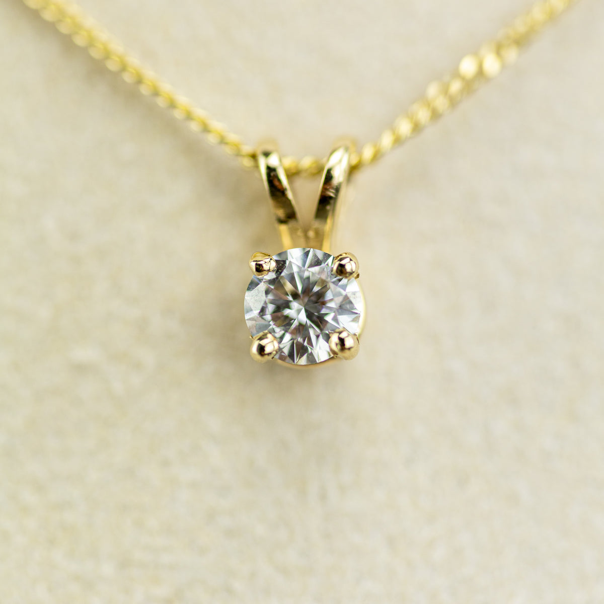 0.30ct Natural GIA Certified Round Pendant With 9 Karat Yellow Gold Claw & Chain available at RR Jewellers
