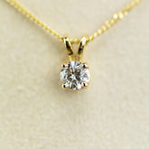 0.30ct Natural GIA Certified Round Pendant With 9 Karat Yellow Gold Claw & Chain available at RR Jewellers