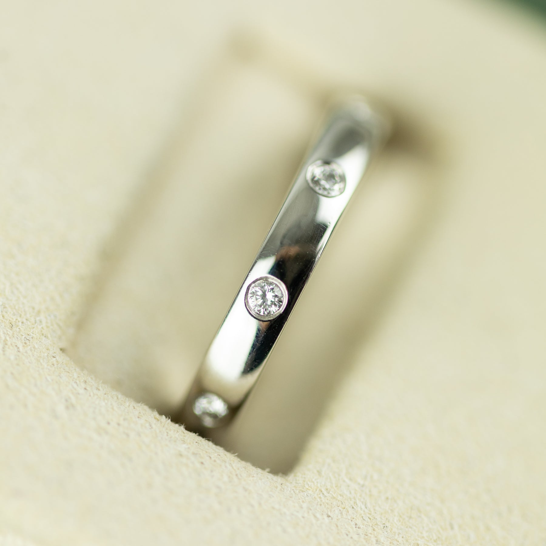 Platinum diamond flush set station ring