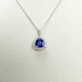 18ct White Gold Trilliant Cut Tanzanite And Diamond Double Halo Pendant At RR Jewellers Yarm