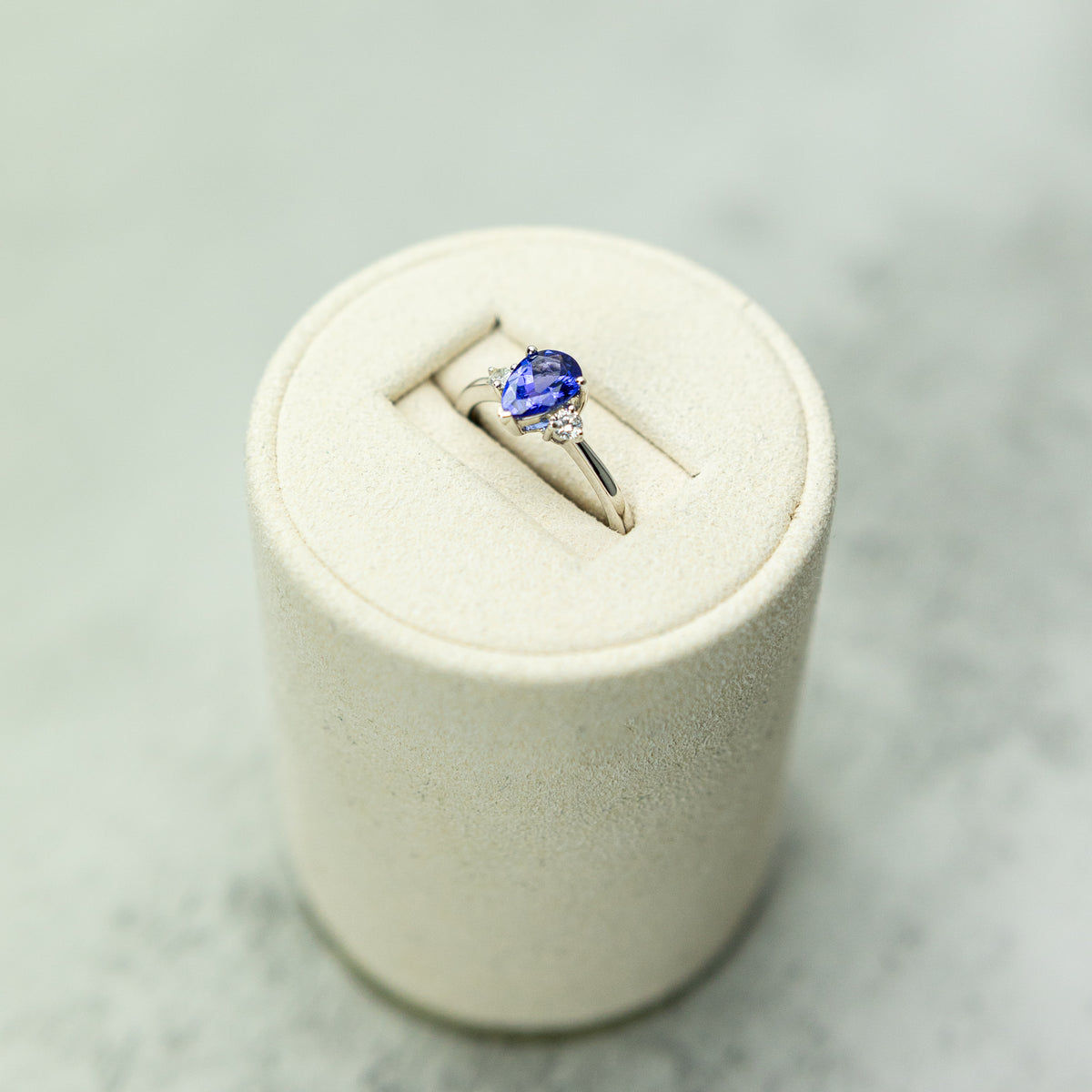 18ct White Gold Pear Cut Tanzanite Ring With Diamond Accents available at RR Jewellers Yarm