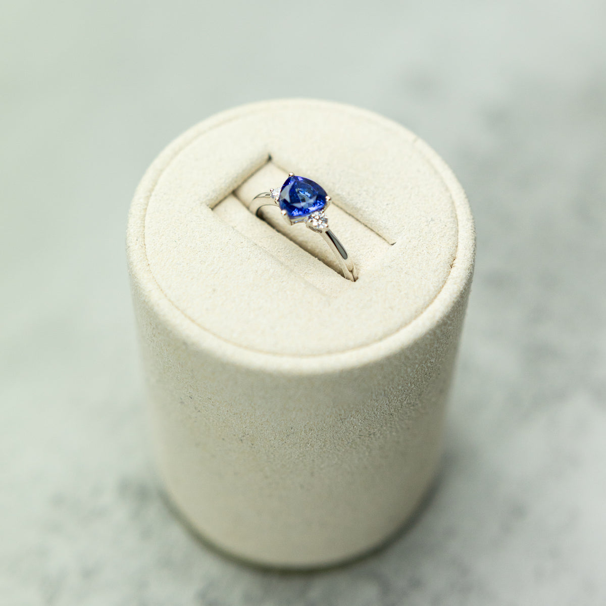 18ct White Gold Trilliant Cut Tanzanite Ring With Diamond Accents Available at RR Jewellers Yarm