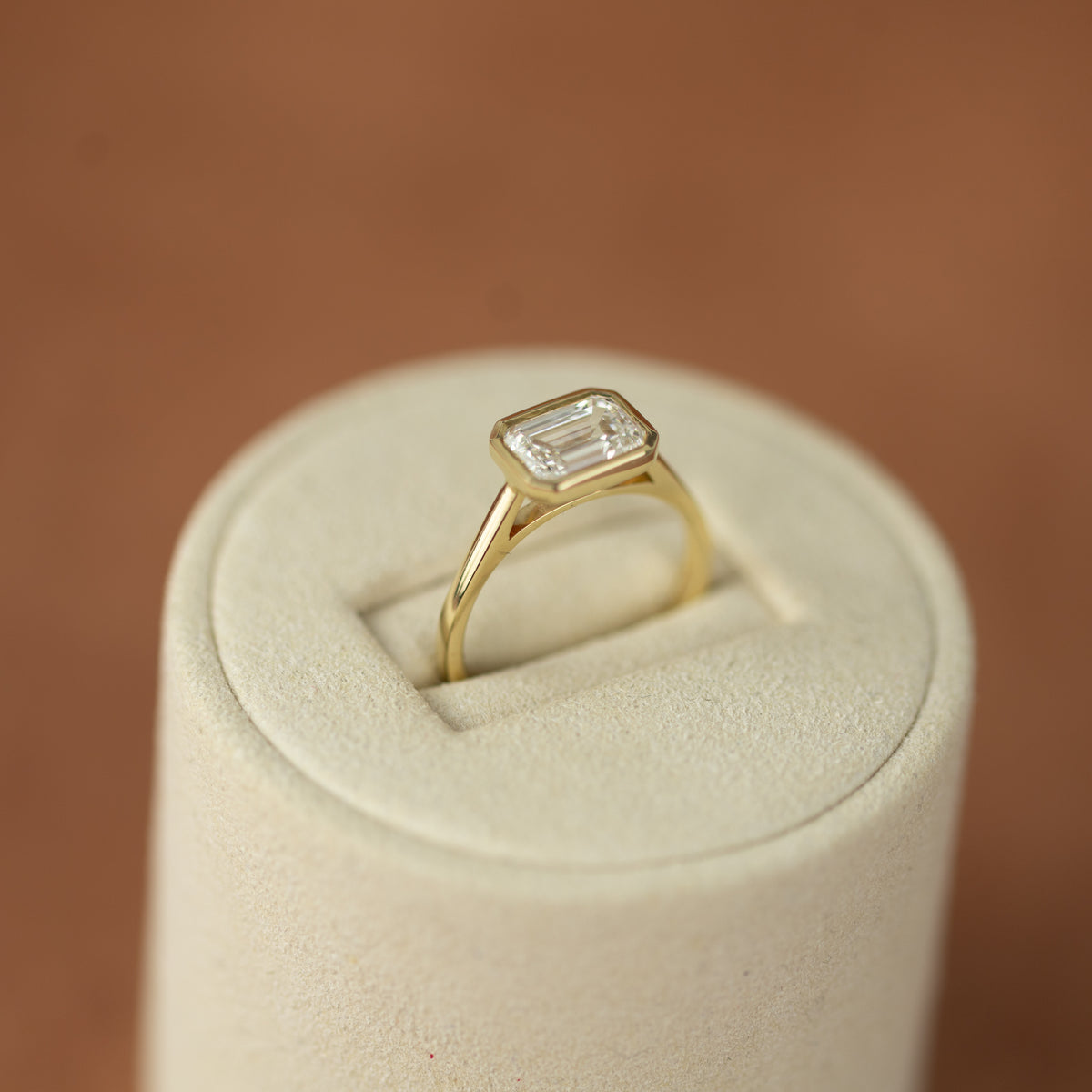 9ct yellow gold 1.90 emerald cut horizontal bezel set solitaire ring
