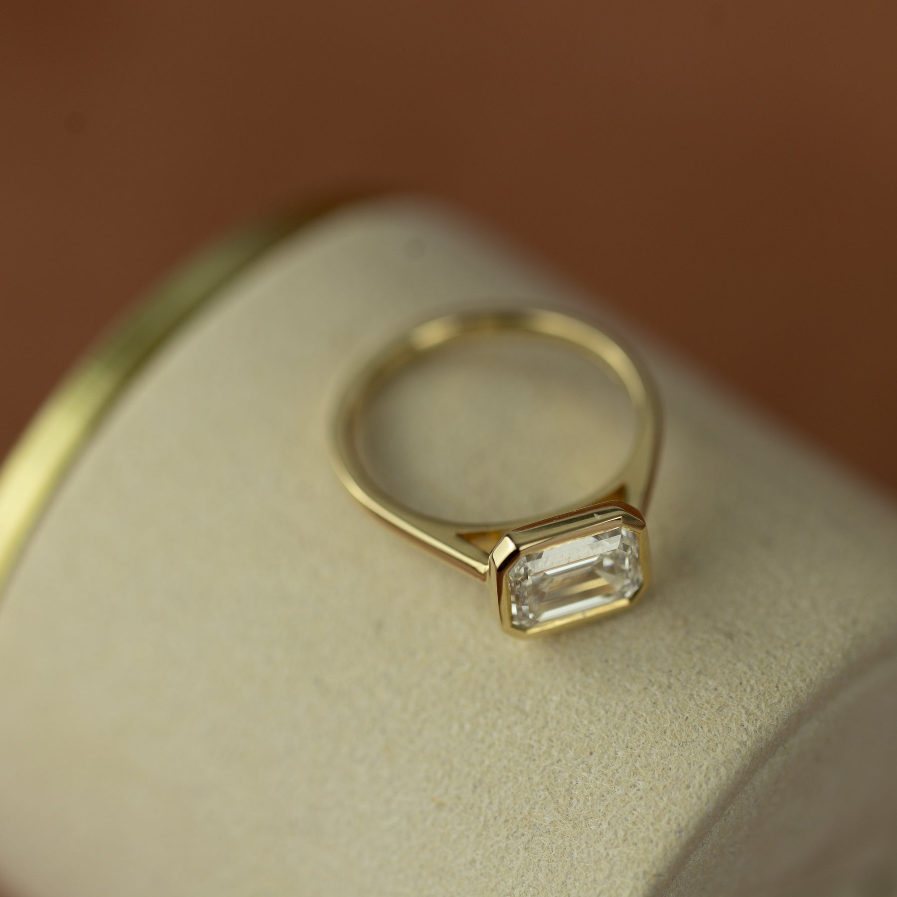 9ct yellow gold 1.90 emerald cut horizontal bezel set solitaire ring