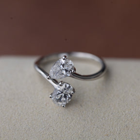 9ct white gold pear & oval cut diamond bypass ring