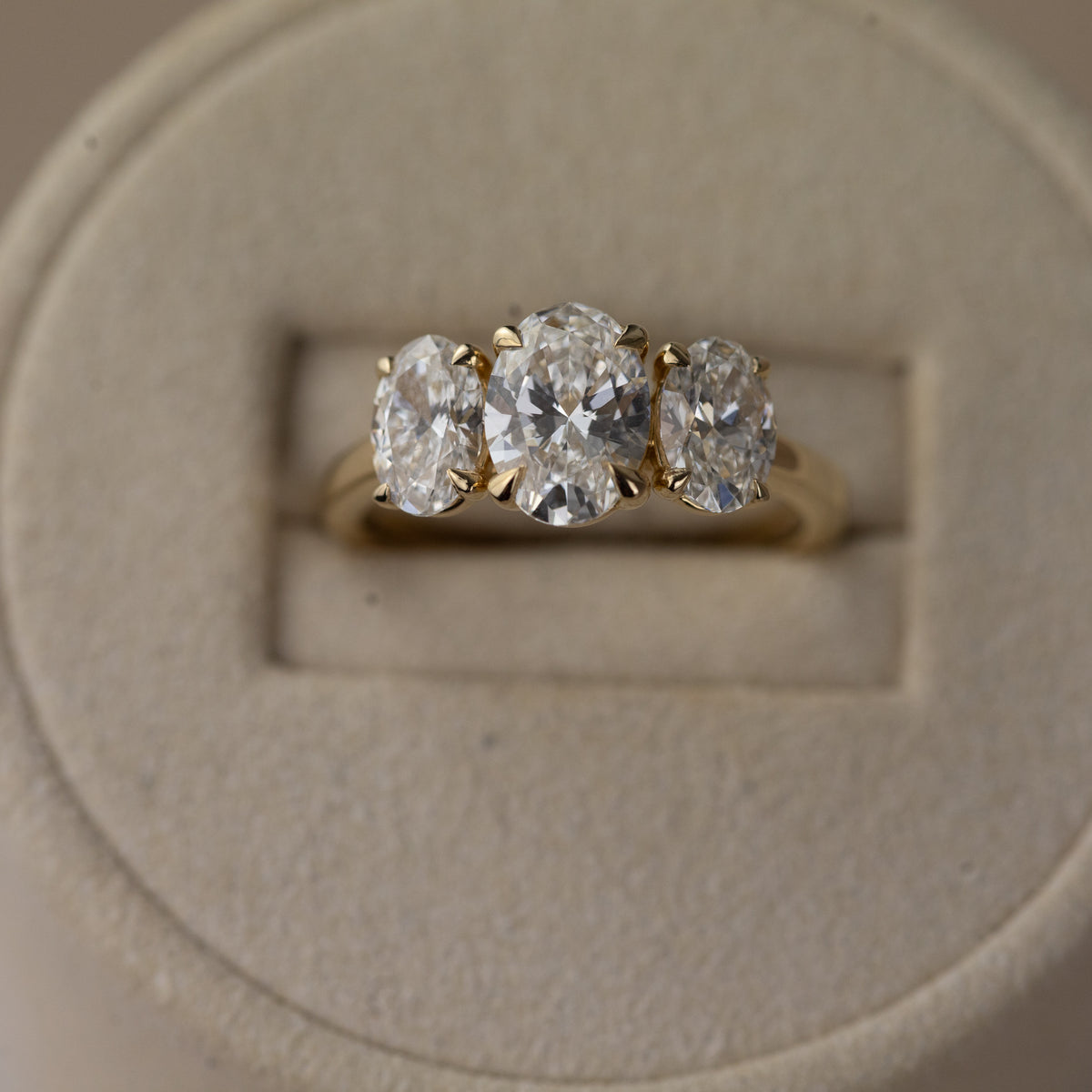 9ct yellow gold graduated 2.25ct oval cut trilogy ring