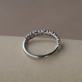Platinum pear cut claw set eternity ring