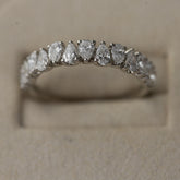 Platinum pear cut claw set eternity ring