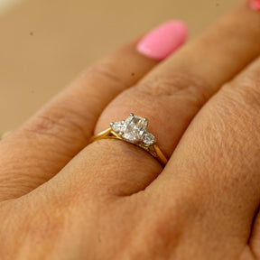 9ct yellow gold cushion cut 0.62ct diamond trilogy ring