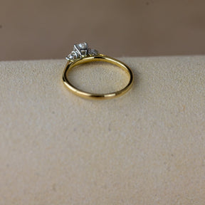 9ct yellow gold cushion cut 0.62ct diamond trilogy ring