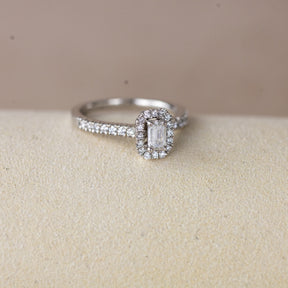 Platinum 0.33ct emerald cut lab diamond halo ring with diamond shoulders