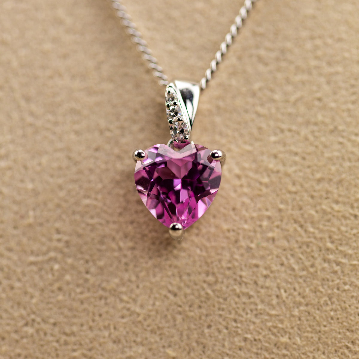 9ct white gold pink sapphire and diamond heart pendant