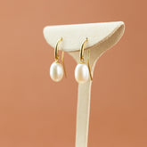 River Pearl Teardrop Crook Earrings in 9 Karat Yellow Gold at RR Jewellers Yarm UK