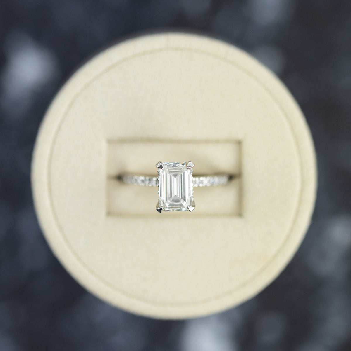 2.39 Carat, Emerald Cut Hidden Halo Ring with Diamond Shoulders available at RR Jewellers 
