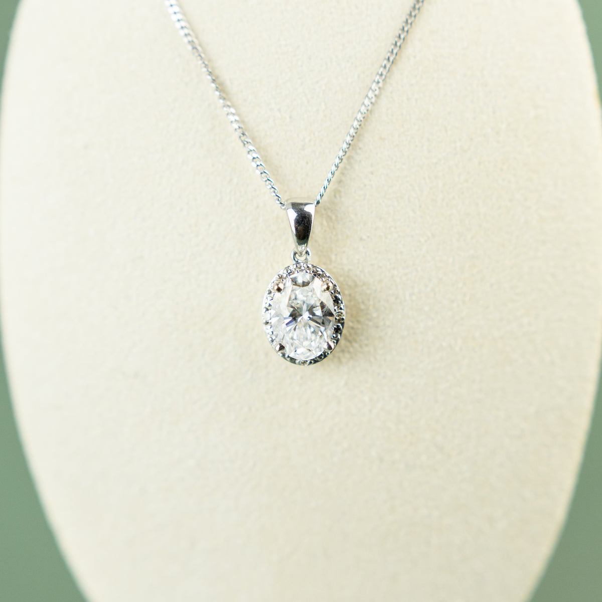 9 Karat White Gold Halo Diamond Pendant with 1.24ct at RR Jewellers Yarm UK