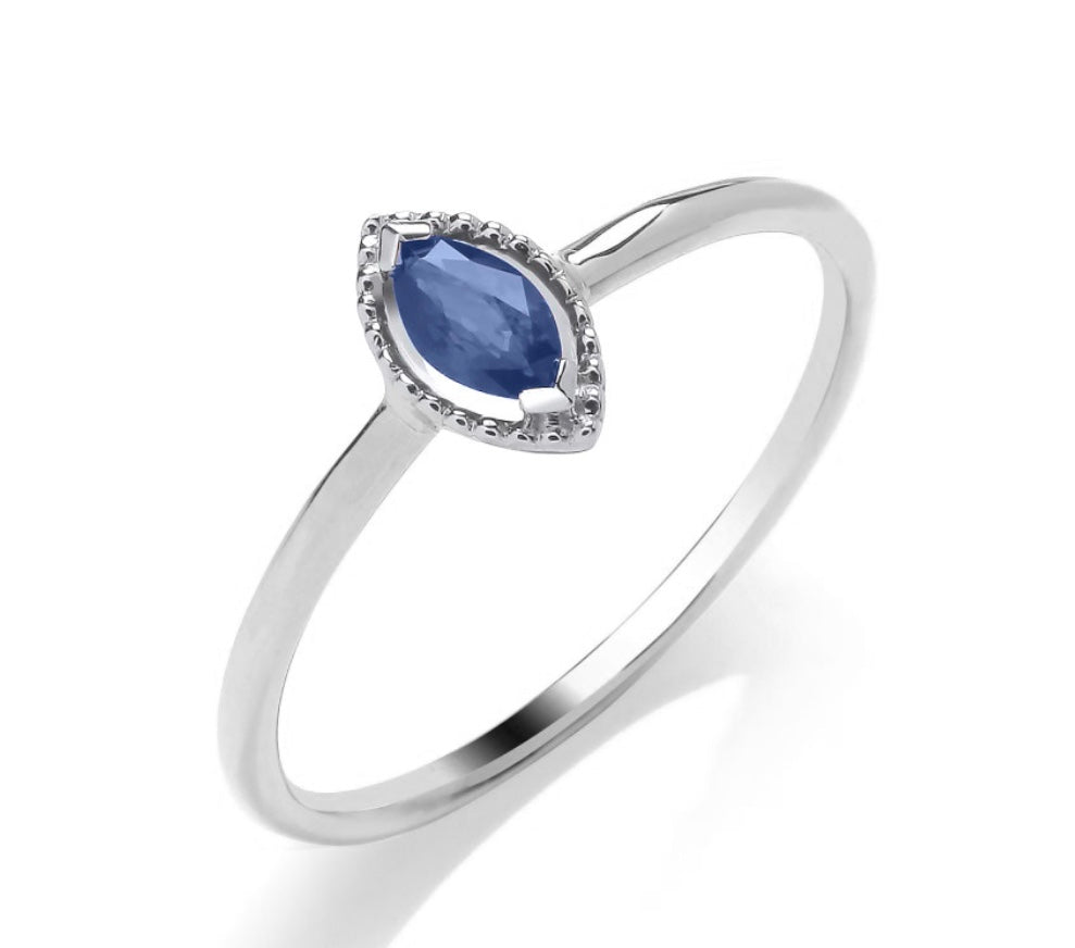 9ct white gold marquise cut sapphire ring set with 0.10ct diamond halo
