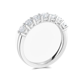 Brilliant round cut diamond seven stone claw set flat court eternity ring