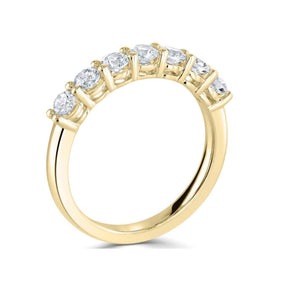 Brilliant round cut diamond seven stone claw set flat court eternity ring