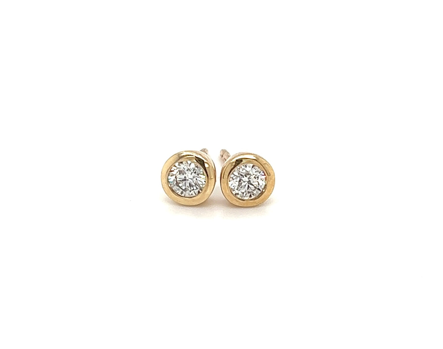 9ct yellow gold diamond bezel set stud earrings 0.30