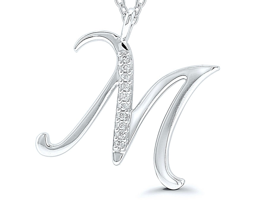 9ct white gold diamond initial M necklace 16-18 inch curb chain.