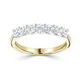 Brilliant round cut diamond seven stone claw set eternity ring