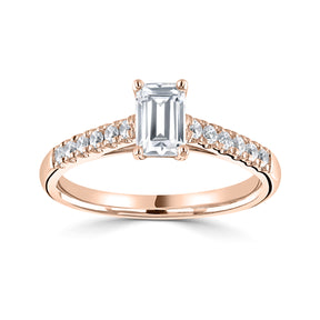 Emerald cut diamond 4 claw set with diamond shoulders engagement ring