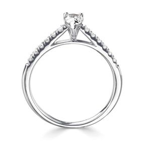 Pear cut diamond set into a classic 3 claw setting with diamond set shoulders ring