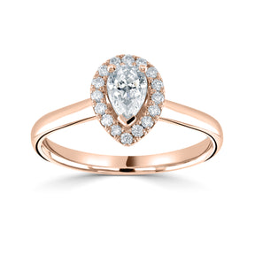 Pear cut diamond set into a classic 3 claw setting surrounded with a diamond  halo engagement ring